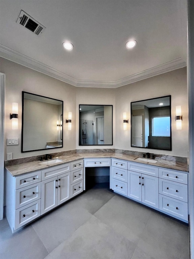 bathroom featuring ornamental molding, vanity, recessed lighting, and a shower