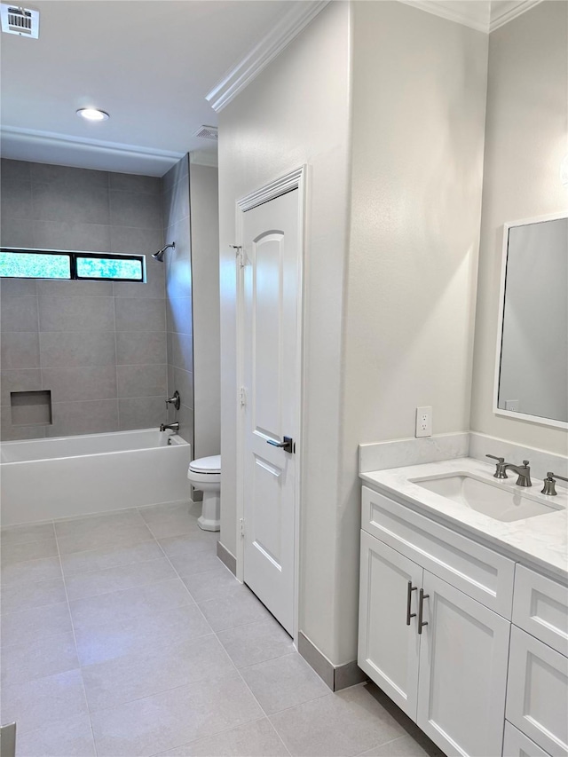 bathroom featuring ornamental molding, toilet, tile patterned flooring, shower / tub combination, and vanity