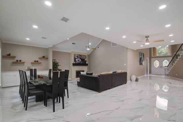 2616 Ryder Ct, League City, TX 77573 - dining room with ornamental molding, ceiling fan, light marble finish floors, recessed lighting, and stairs