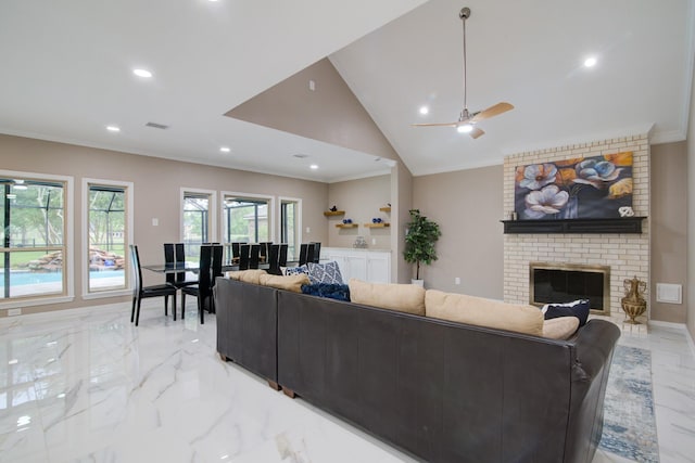 2616 Ryder Ct, League City, TX 77573 - living room with light marble finish floors, ornamental molding, recessed lighting, ceiling fan, and a fireplace