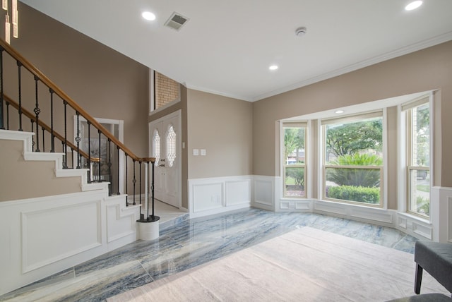 2616 Ryder Ct, League City, TX 77573 - foyer entrance with a decorative wall, stairway, recessed lighting, and crown molding
