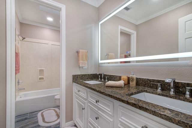 2616 Ryder Ct, League City, TX 77573 - bathroom with crown molding, toilet, double vanity, and shower / bath combination