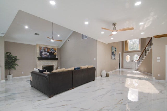 2616 Ryder Ct, League City, TX 77573 - living room featuring a ceiling fan, stairs, recessed lighting, light marble finish flooring, and crown molding