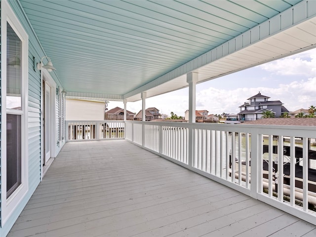 1322 Oahu Dr, Tiki Island, TX 77554 - wooden terrace with a residential view
