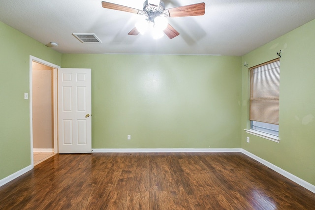 15522 Noble Brook Ct, Houston, TX 77049 - unfurnished room with wood finished floors, baseboards, and a ceiling fan