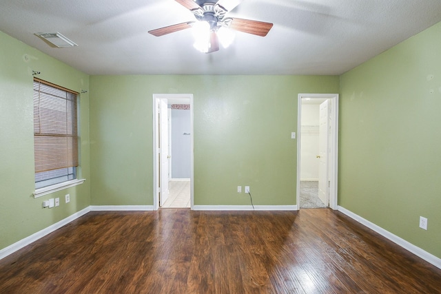 15522 Noble Brook Ct, Houston, TX 77049 - unfurnished room featuring wood finished floors, baseboards, and a ceiling fan