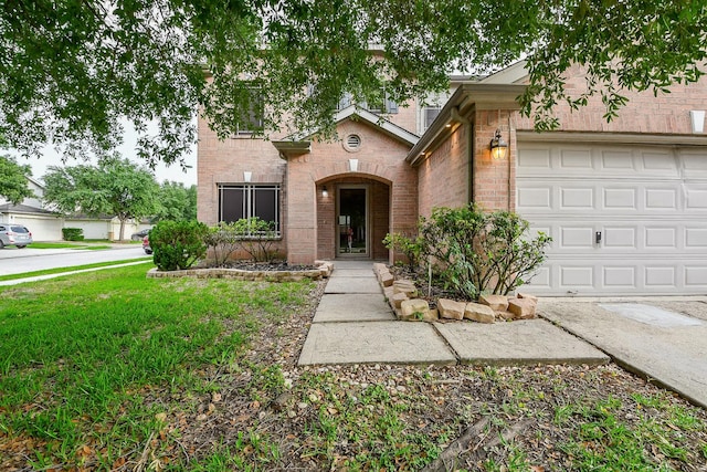 15522 Noble Brook Ct, Houston, TX 77049 - view of front of home featuring brick siding and a garage