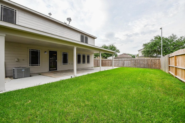 15522 Noble Brook Ct, Houston, TX 77049 - view of yard featuring central AC and a patio area
