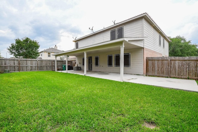 15522 Noble Brook Ct, Houston, TX 77049 - back of house with a patio area, cooling unit, and brick siding