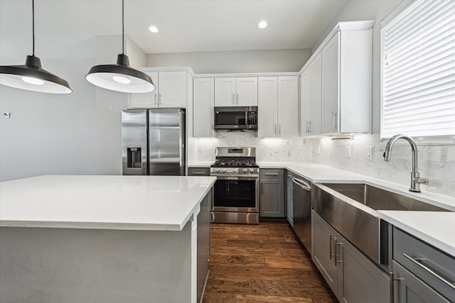 622 Janisch Rd Unit A, Houston, TX 77018 - kitchen featuring appliances with stainless steel finishes, decorative backsplash, light countertops, gray cabinets, and recessed lighting