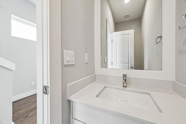 622 Janisch Rd Unit A, Houston, TX 77018 - bathroom with vanity, wood finished floors, and baseboards