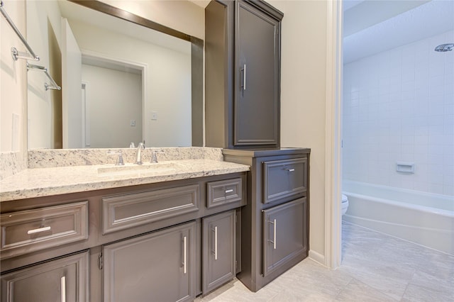 full bathroom with vanity, toilet, and bathing tub / shower combination