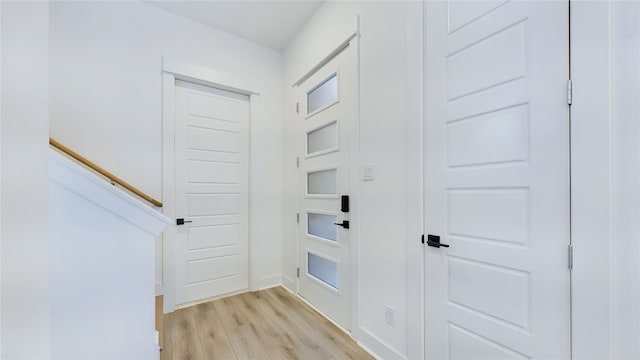 3019 Jensen Springs Ln, Houston, TX 77026 - doorway to outside featuring light wood-style floors