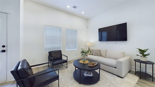 3019 Jensen Springs Ln, Houston, TX 77026 - living area featuring wood finished floors, baseboards, and recessed lighting