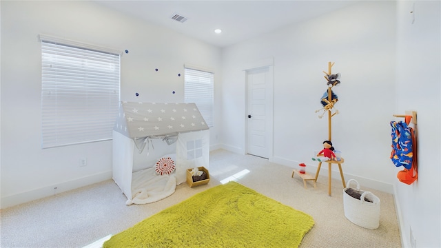 3019 Jensen Springs Ln, Houston, TX 77026 - rec room featuring carpet, baseboards, and recessed lighting