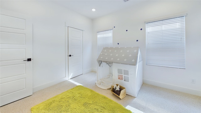 3019 Jensen Springs Ln, Houston, TX 77026 - carpeted bedroom with baseboards and recessed lighting