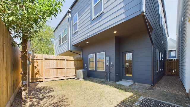3019 Jensen Springs Ln, Houston, TX 77026 - rear view of property featuring cooling unit and a fenced backyard