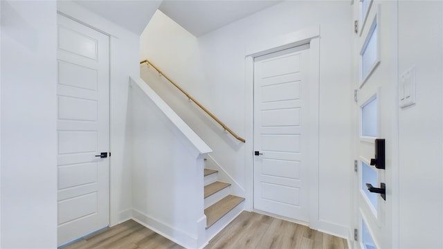 3019 Jensen Springs Ln, Houston, TX 77026 - stairway with wood finished floors and baseboards