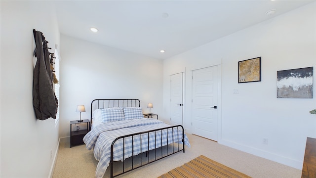 3019 Jensen Springs Ln, Houston, TX 77026 - bedroom featuring carpet floors, baseboards, and recessed lighting