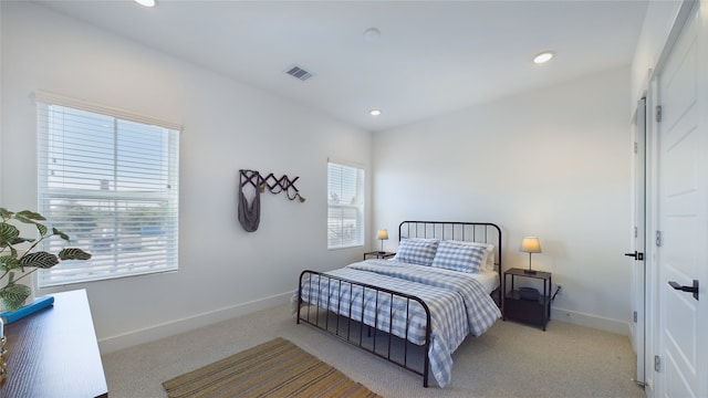 3019 Jensen Springs Ln, Houston, TX 77026 - bedroom featuring carpet flooring, baseboards, and recessed lighting