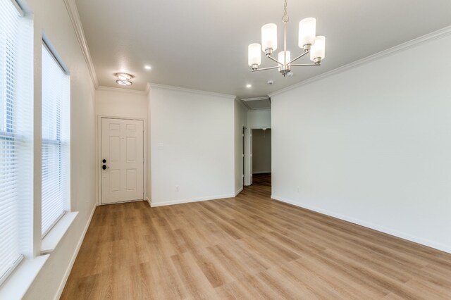 11761 Jelicoe Dr, Houston, TX 77047 - unfurnished room featuring light wood-type flooring, a chandelier, crown molding, baseboards, and recessed lighting