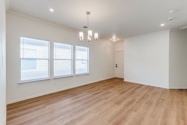 11761 Jelicoe Dr, Houston, TX 77047 - unfurnished room with crown molding, light wood finished floors, a chandelier, baseboards, and recessed lighting