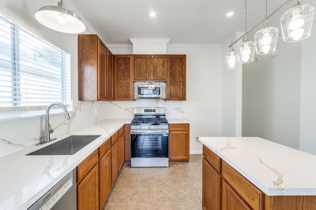 11761 Jelicoe Dr, Houston, TX 77047 - kitchen with stainless steel appliances, a sink, brown cabinetry, light stone counters, and crown molding