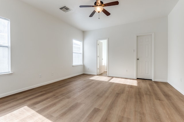 11761 Jelicoe Dr, Houston, TX 77047 - empty room with ceiling fan, light wood-style flooring, and baseboards