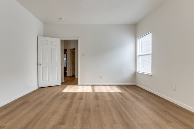 11761 Jelicoe Dr, Houston, TX 77047 - spare room featuring light wood-type flooring and baseboards
