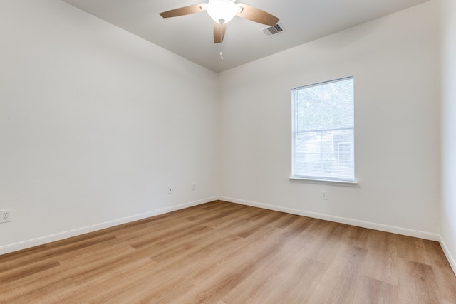 11761 Jelicoe Dr, Houston, TX 77047 - empty room with light wood-type flooring, baseboards, and a ceiling fan