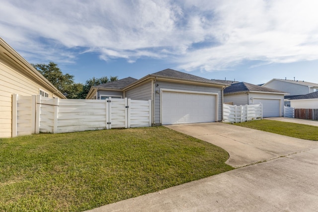11761 Jelicoe Dr, Houston, TX 77047 - view of home's exterior featuring a gate and driveway