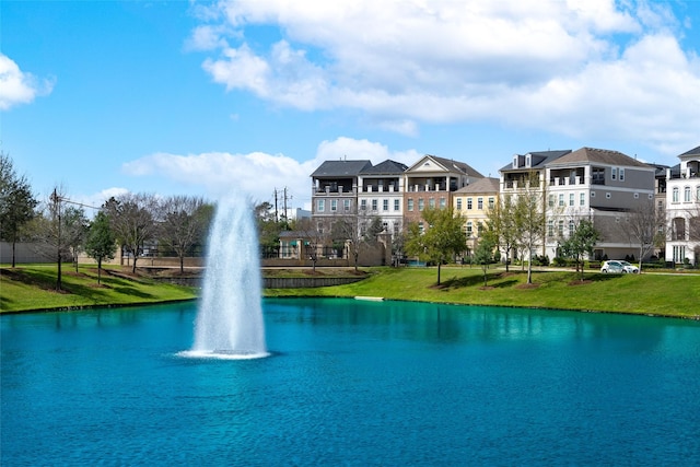 831 Dunleigh Meadows Ln, Houston, TX 77055 - view of home's community with a water view and a lawn