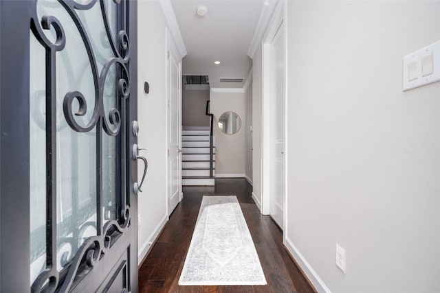 831 Dunleigh Meadows Ln, Houston, TX 77055 - corridor with dark wood finished floors, baseboards, stairs, and ornamental molding