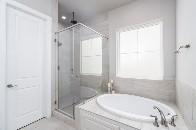 831 Dunleigh Meadows Ln, Houston, TX 77055 - bathroom featuring a shower stall and a garden tub
