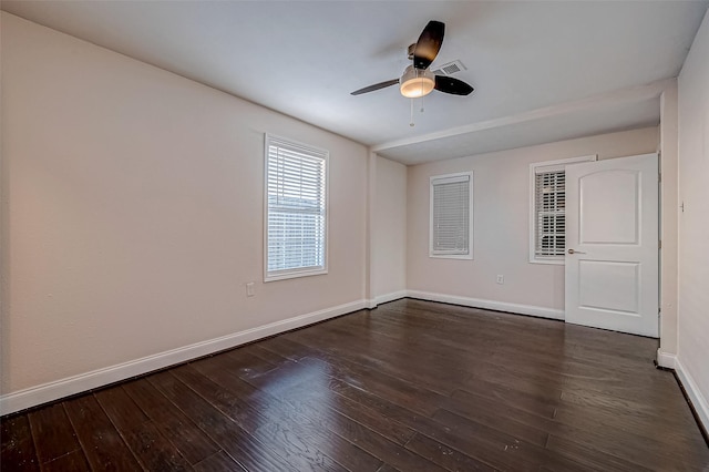 unfurnished room featuring baseboards, hardwood / wood-style floors, and ceiling fan
