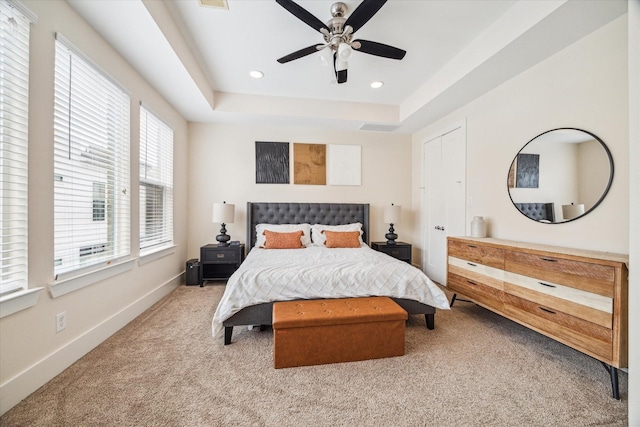 209 Burr St Unit D, Houston, TX 77011 - bedroom with carpet floors, recessed lighting, a tray ceiling, baseboards, and a ceiling fan
