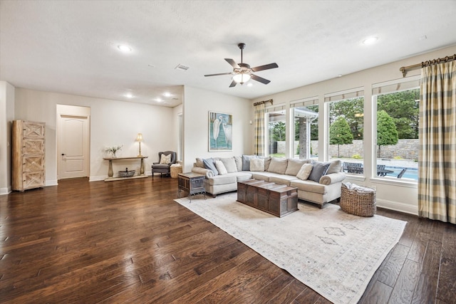 5119 Kendalia Cloud Ln, Fulshear, TX 77441 - living area featuring a ceiling fan, recessed lighting, dark wood-style flooring, and baseboards