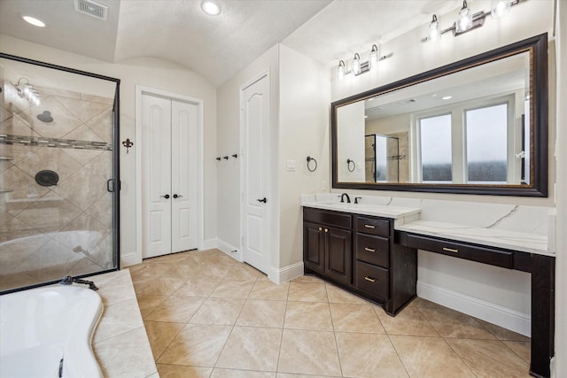 5119 Kendalia Cloud Ln, Fulshear, TX 77441 - full bathroom with a stall shower, vanity, a garden tub, baseboards, and tile patterned flooring