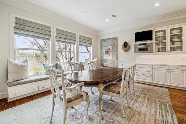 5602 Indian Cir, Houston, TX 77056 - dining area with ornamental molding, recessed lighting, and wood finished floors