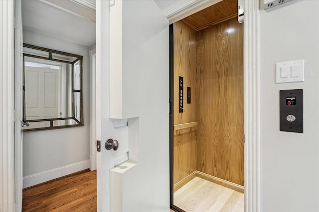 5602 Indian Cir, Houston, TX 77056 - bathroom featuring wood finished floors, baseboards, and elevator