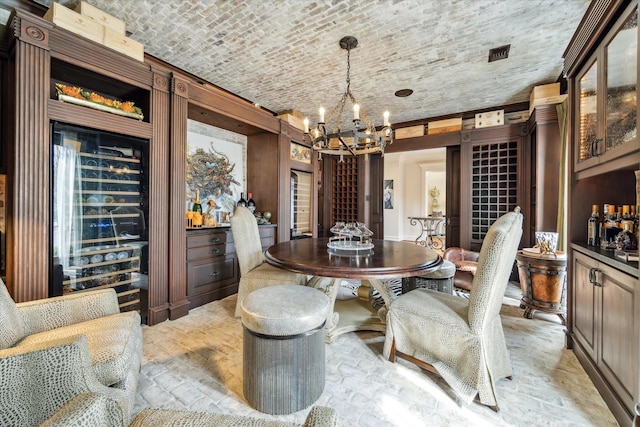 5602 Indian Cir, Houston, TX 77056 - dining space featuring a chandelier, brick ceiling, and a bar