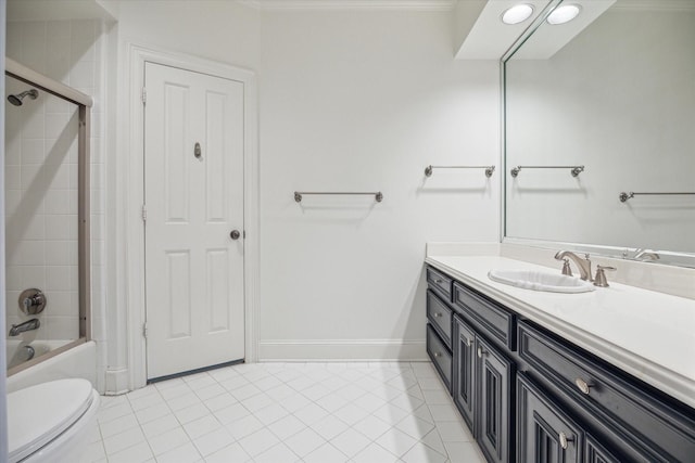 5602 Indian Cir, Houston, TX 77056 - full bathroom featuring toilet, vanity, tile patterned floors, shower / bathtub combination, and baseboards