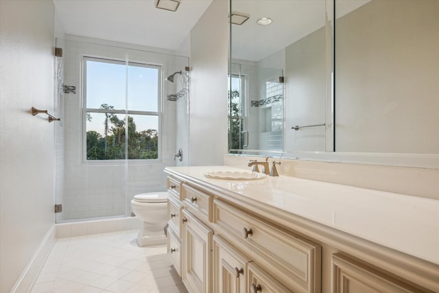 5602 Indian Cir, Houston, TX 77056 - bathroom featuring toilet, a shower stall, tile patterned flooring, vanity, and baseboards