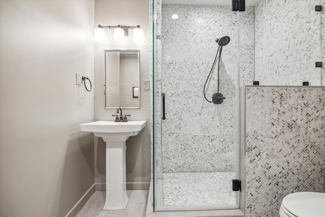 5602 Indian Cir, Houston, TX 77056 - full bathroom with a stall shower, toilet, and baseboards