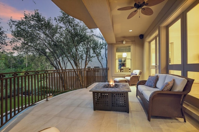 5602 Indian Cir, Houston, TX 77056 - view of patio / terrace featuring a ceiling fan and an outdoor living space with a fire pit
