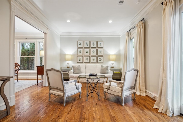 5602 Indian Cir, Houston, TX 77056 - living area with crown molding, wood finished floors, and recessed lighting