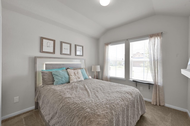 2233 Forest Chestnut Dr, Spring, TX 77386 - bedroom featuring lofted ceiling, carpet flooring, and baseboards