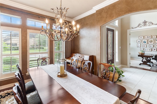 208 Canyon Oak Dr, Lake Jackson, TX 77566 - dining space with arched walkways, healthy amount of natural light, ornamental molding, a chandelier, and light tile patterned floors