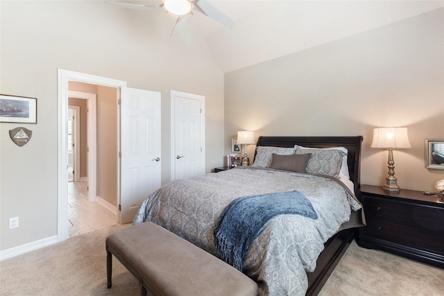 208 Canyon Oak Dr, Lake Jackson, TX 77566 - bedroom featuring light carpet, high vaulted ceiling, a ceiling fan, and baseboards