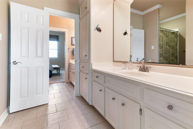 208 Canyon Oak Dr, Lake Jackson, TX 77566 - full bathroom with ornamental molding, vanity, baseboards, and tile patterned flooring